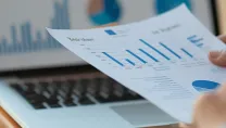 printed document being held in the hand
