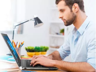 man working at computer