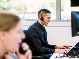 Man and woman providing remote IT Support