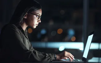 business woman working on her laptop securely