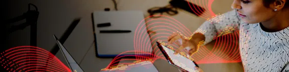 Woman reading from a tablet 