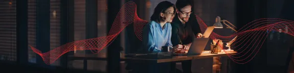 Team mates on laptop