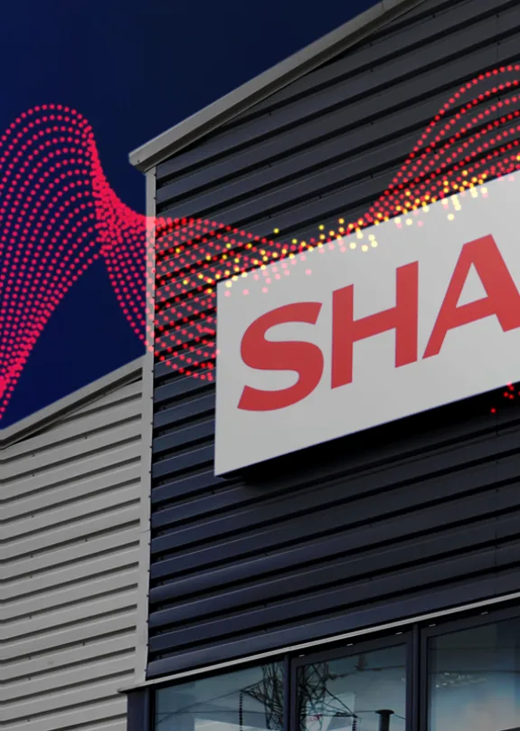 Large building with the sharp logo on